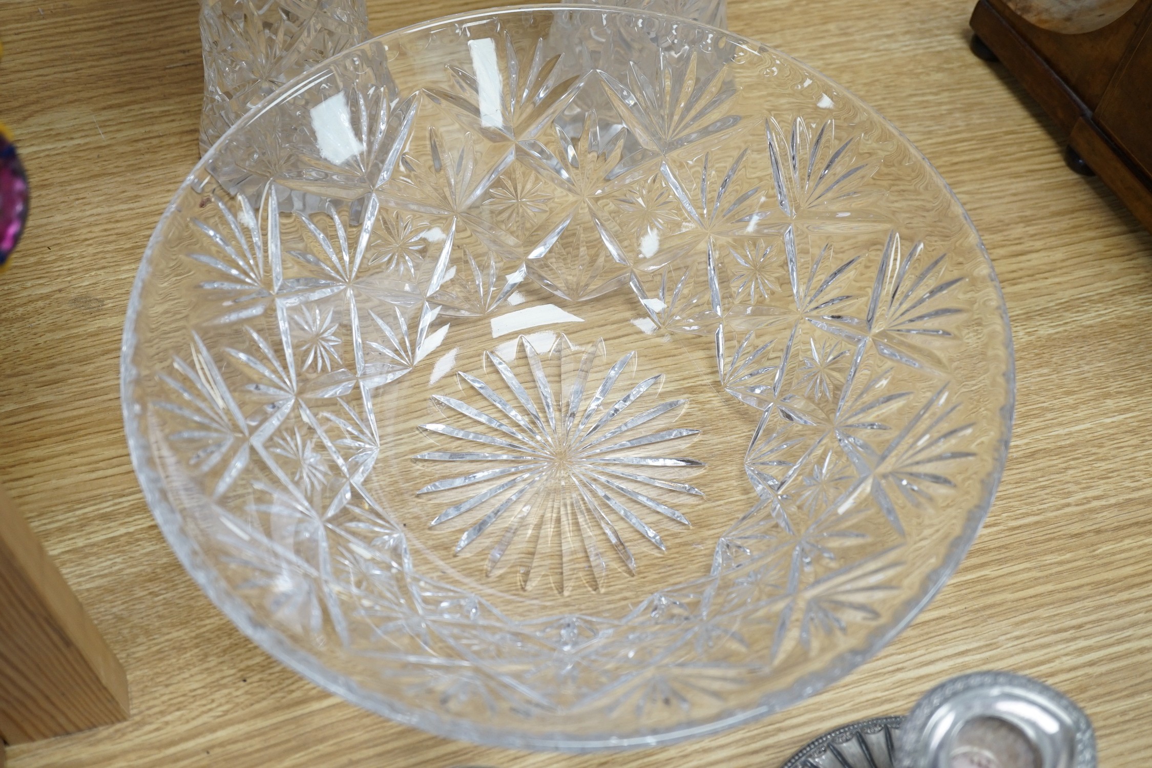 A pair of Doulton cut glass vases and a bowl plus a pair of silver plated candlesticks and a dish, vases 25cms high
